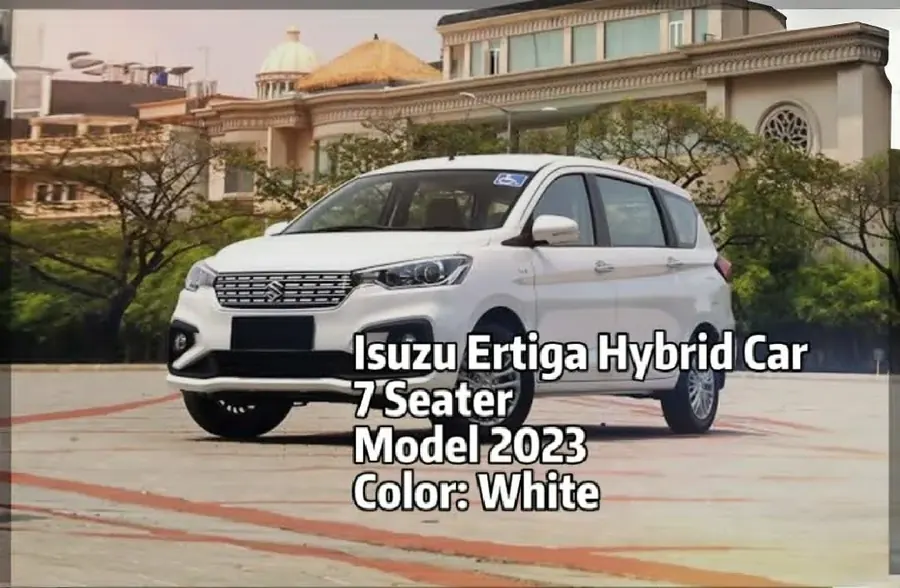 White 2023 Suzuki Ertiga Hybrid seven-seater photographed from the front