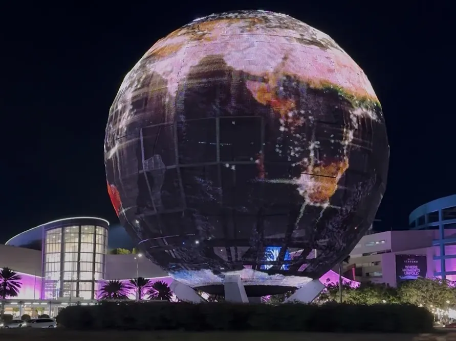 The illuminated globe outside SM Mall of Asia at night