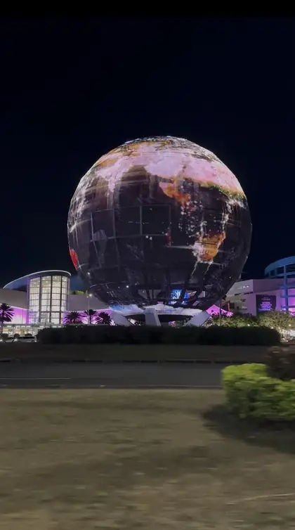 The illuminated globe outside SM Mall of Asia at night